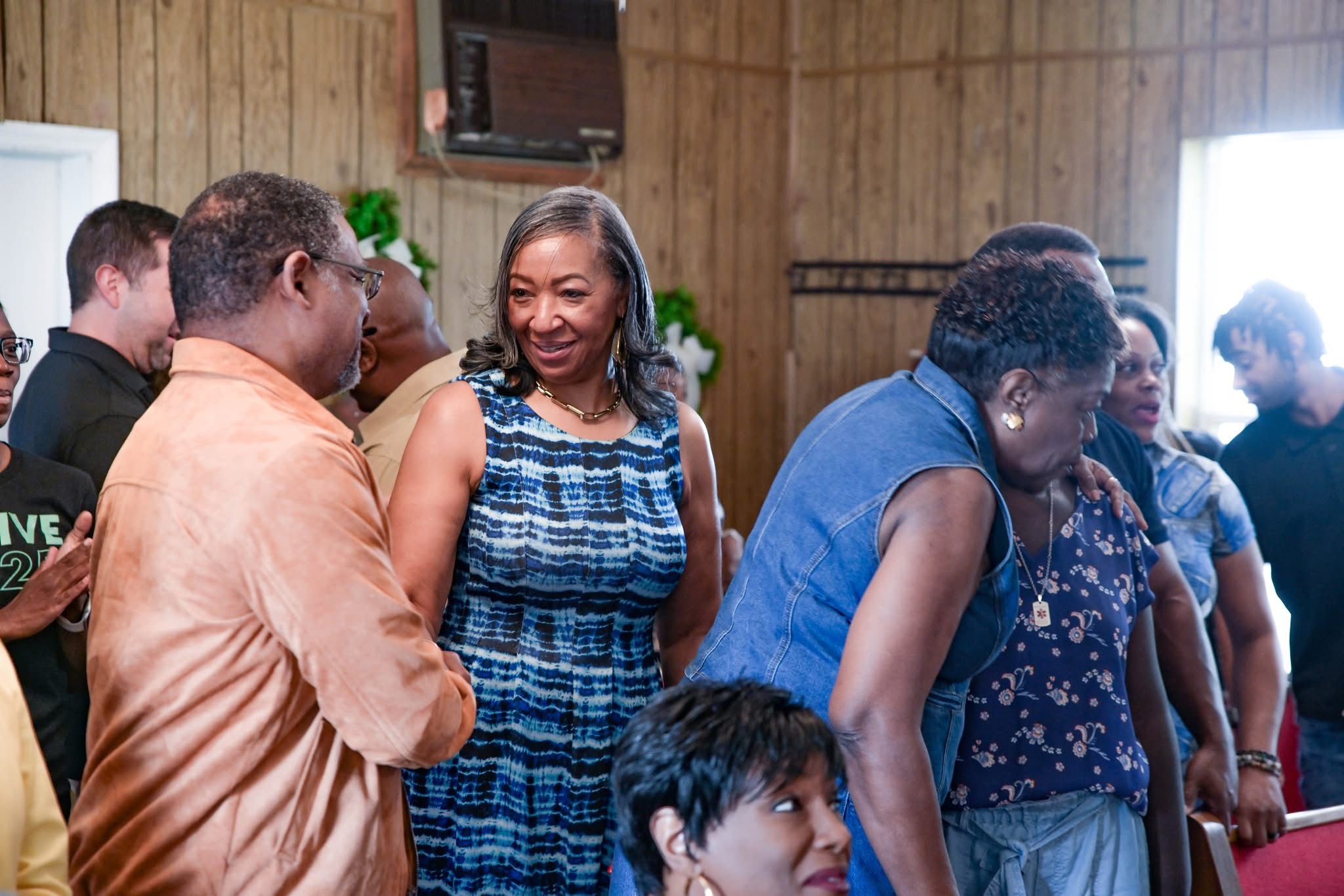 Members sharing fellowship at The Luke